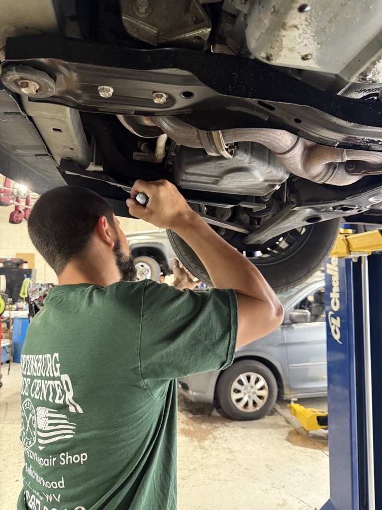 How are ball joints inspected for wear?